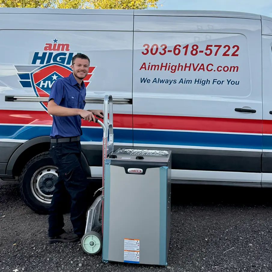 Homeowner speaking with an HVAC professional about equipment options and home comfort solutions
